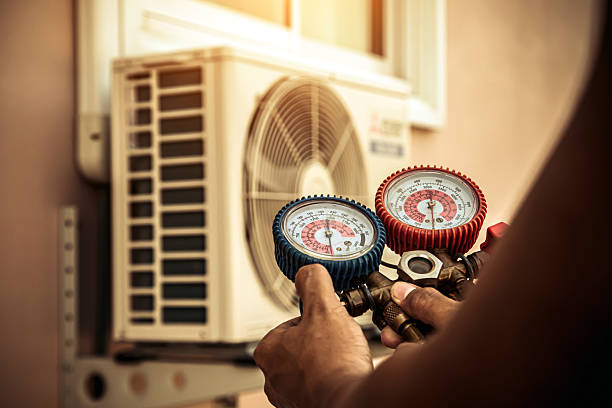 Professional Heat Pump Repair technician working in Massapequa, NY